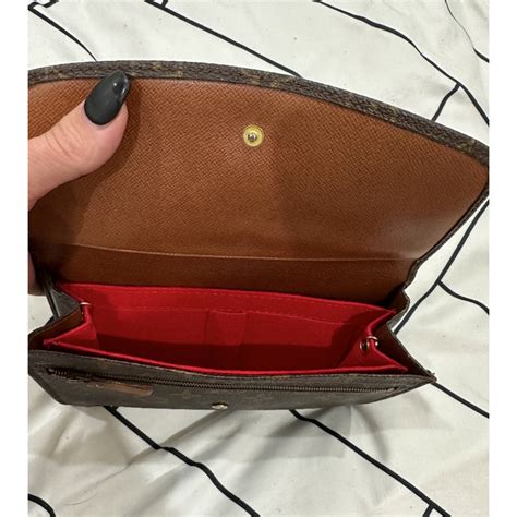 lv rabat clutch